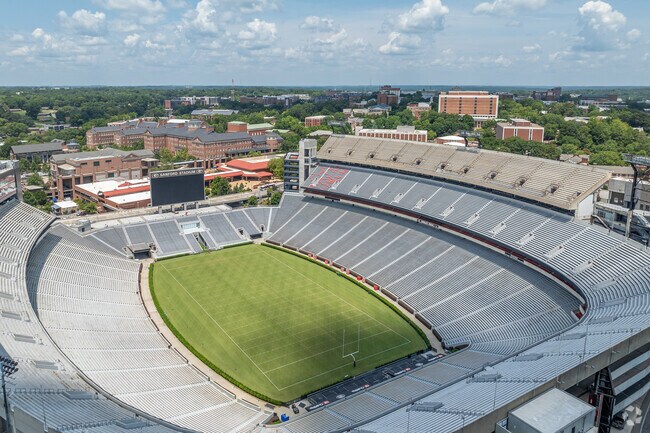 Football game at Sanford stadium near Saint George Place.