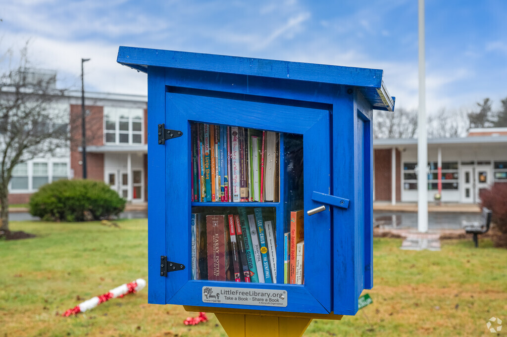 Trade a book at the little library outside Grace Farrar Cole Elementary School in Norwell.