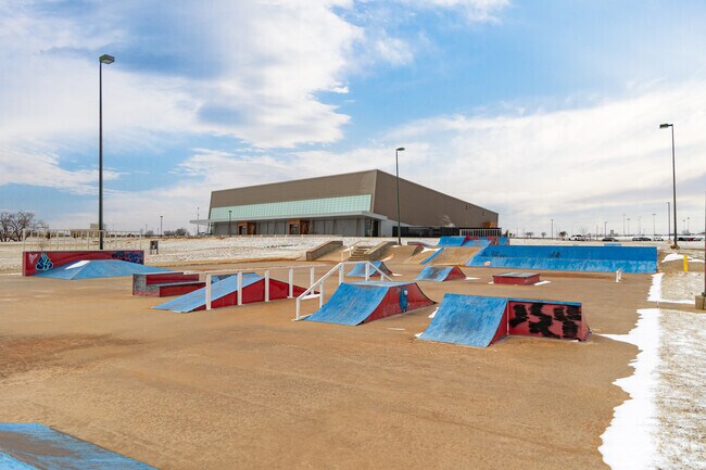Do a flip at the Ackley Park skatepark in Elk City.