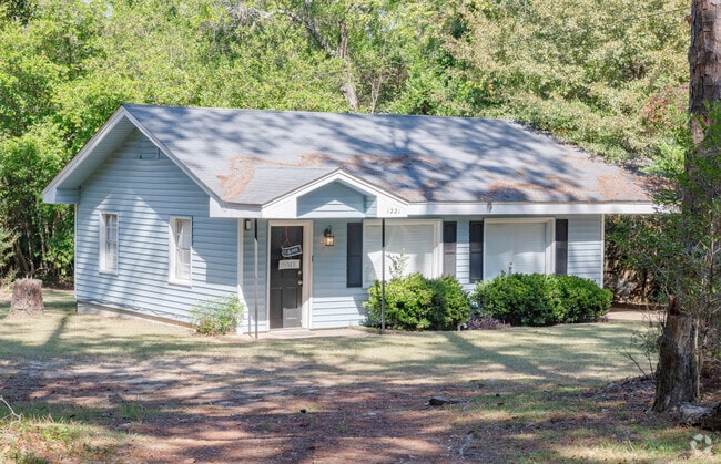 Almost in the Craftsman style, this ranch in Eudgemar has wide eaves and a large porch.