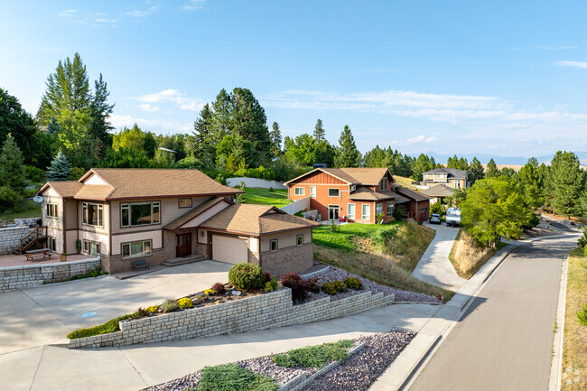 At the Carlton you can see mix of ranch-style homes and farmhouses.