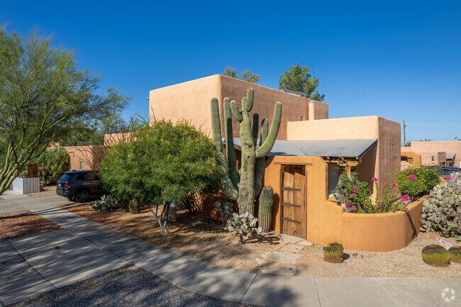 A beautiful, southwestern inspired home in Civano, with round cornered walls.