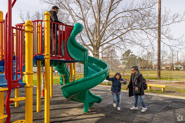 Enjoy the playground equipment at Annunciation Square.