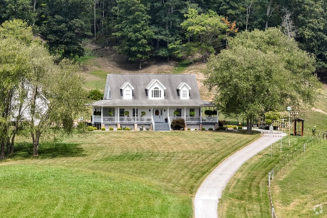 Luttrell’s farmhouses sit at the foot of East Tennessee’s scenic mountain ridges.