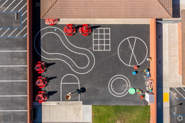 University Park Elementary students head to an outdoor play area during recess.