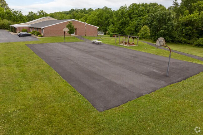 A full-sized basketball court at The Concept School provides a fun way to challenge friends.