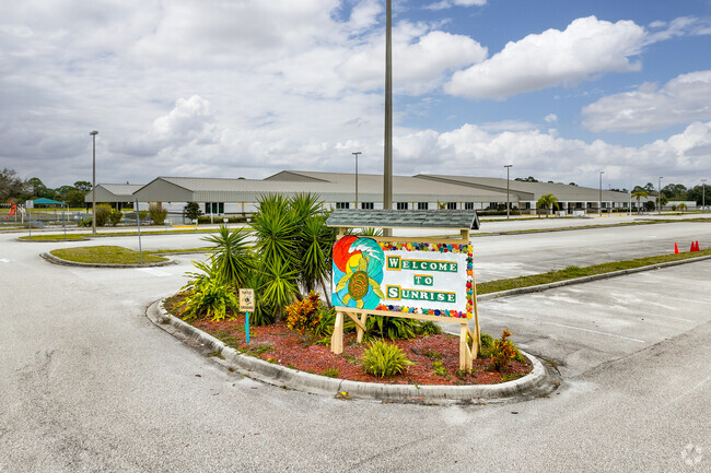 The large colorful Sunrise Elementary School sign welcomes PK-5 students.