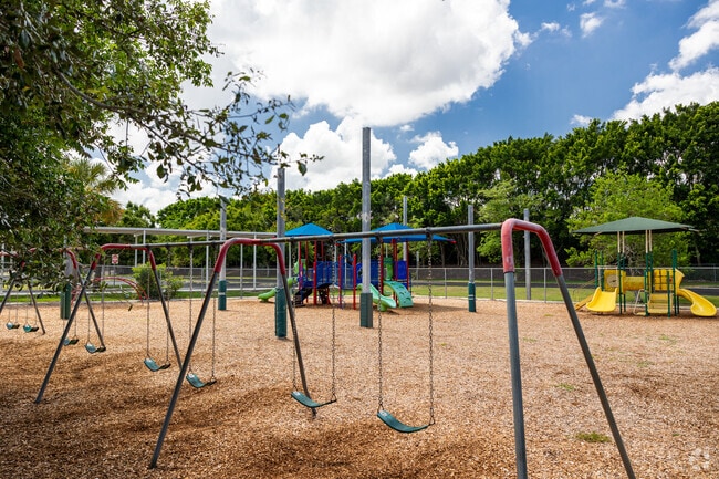 Pelican Marsh Elementary School in Naples has multiple  playgrounds adjacent to the building.