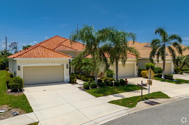 Hear the wind in the palms in your front yard in Boca Royale.