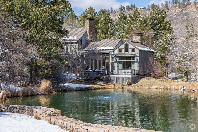 The Village at Castle Pines offers scenic lakeside views for residents.