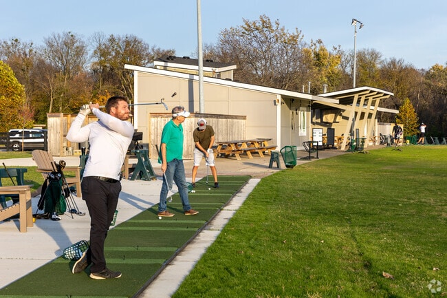 Practice your golf swing at Different Strokes Golf Center near Rolling Fields.