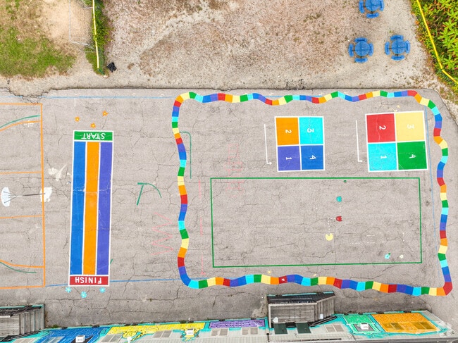 Students of the Lincoln Street School enjoy the colorful black top.