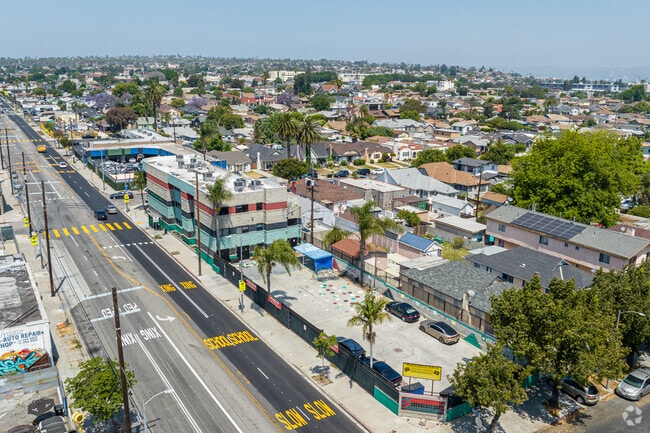 A narrow outdoor playground is available at Marcus Garvey Elementary School in Los Angeles, CA.