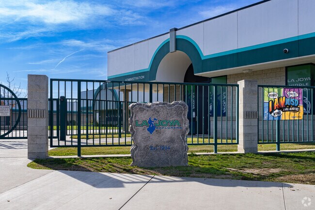 A stone sign outside the entrance to La Joya Middle School in Visalia greets students.