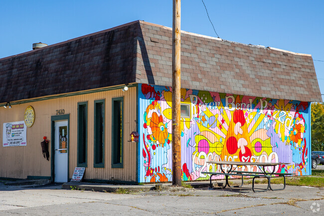 Riverbend Pizza has a colorful wall advertisement you cant miss.