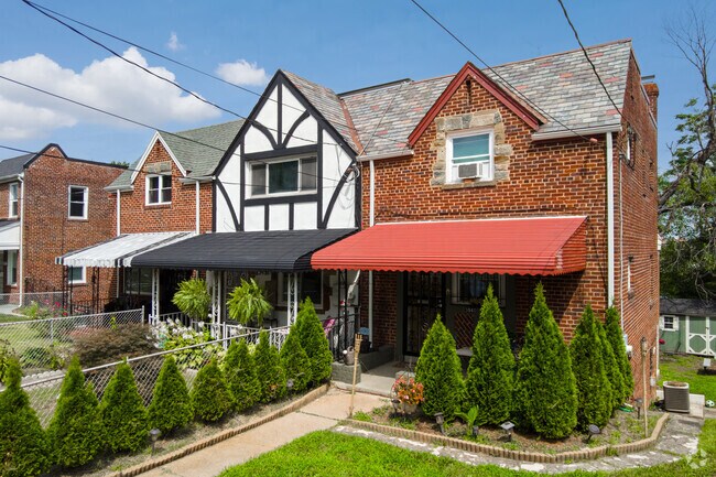 Semi-detached brick row homes are popular in Benning and come in many different styles.