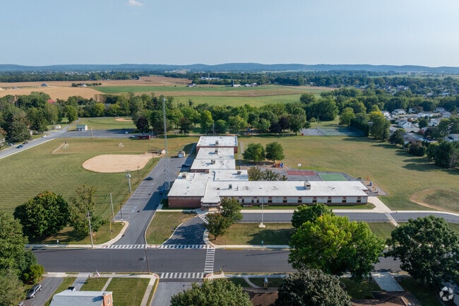 Cleona Elementary School has a large campus with multiple recreational fields for 299 students.