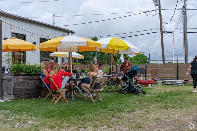 The Bargeboard gives residents the option to sit under umbrellas for shade during the summer.