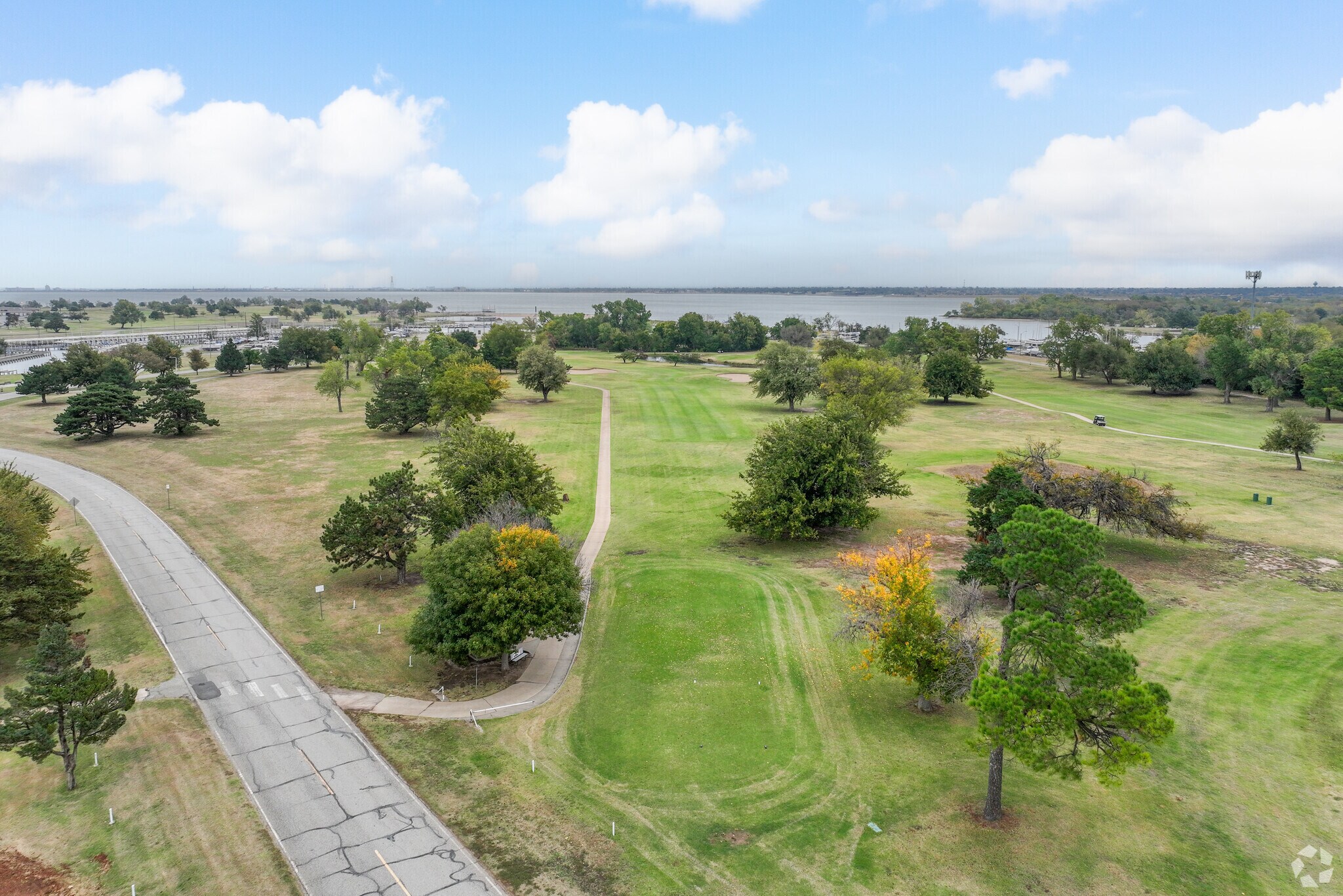 Residents of Knights Lake enjoy playing golf with the view of Lake Hefner.