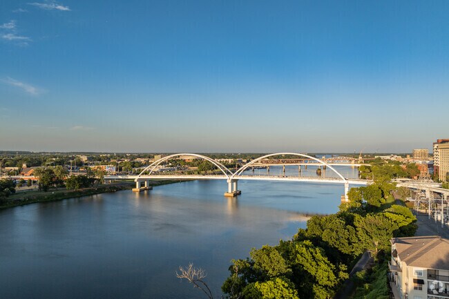 Visitors to Downtown Little Rock enjoy the beauty of the Arkansas River.