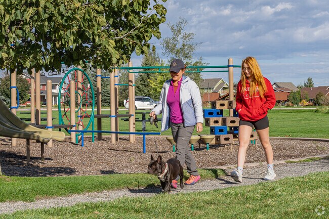 A West Bozeman mother and daughter enjoy their morning walk around Valley West Park.