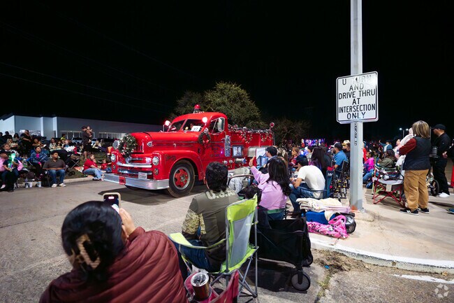 A fire truck comes along the parade route at the Festival of Lights.