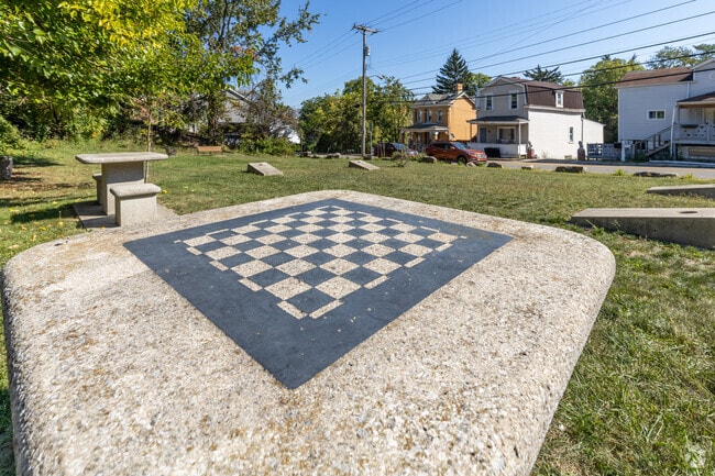 Visit The Corner in Mount Oliver for a game of corn hole or even chess!