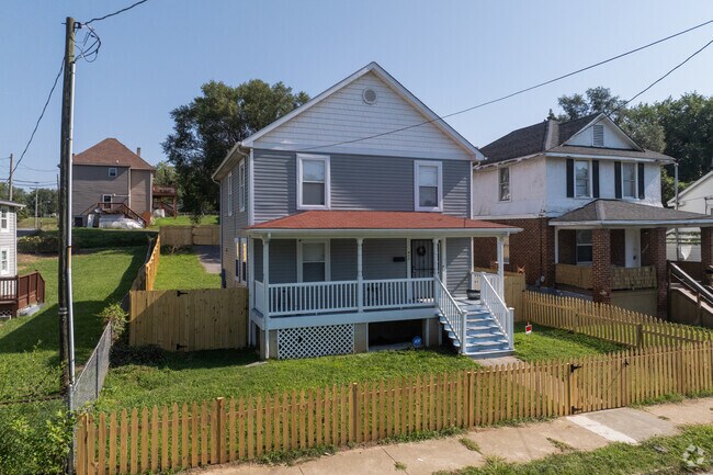 Foursquare homes in Harrison are characterized by their boxy shape and practical design.