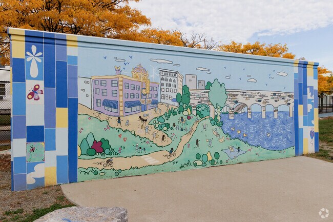 The mural at Payne Park depicts the idyllic nature of Woodlawn.