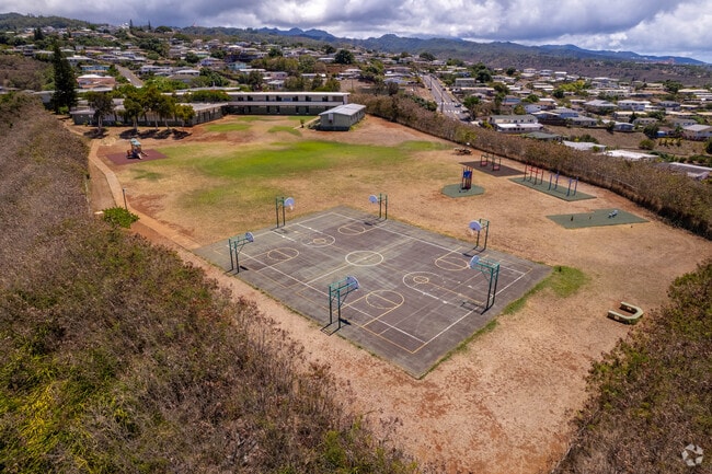 Gustav H Webling Elementary School features a large open field for students in Aiea, HI.