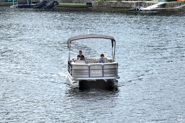 Locals enjoy the day on Northeast Pond in Lebanon.