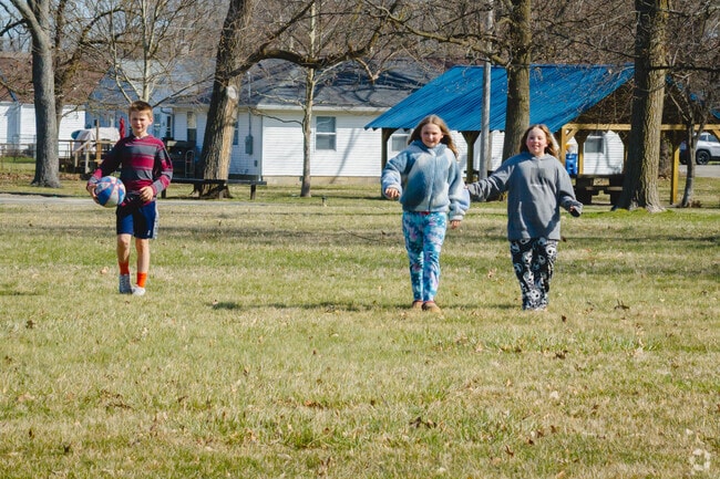 These kids enjoy playing in Cowing Park where there is plenty of room to run.