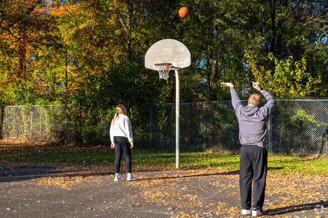 Practice your jump shot at the Marion Ave Playground.