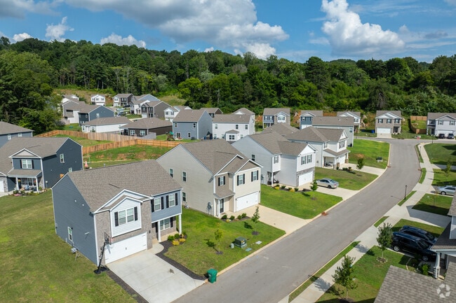 New traditional homes dominate the residential landscape in Amherst’s growing suburbs.