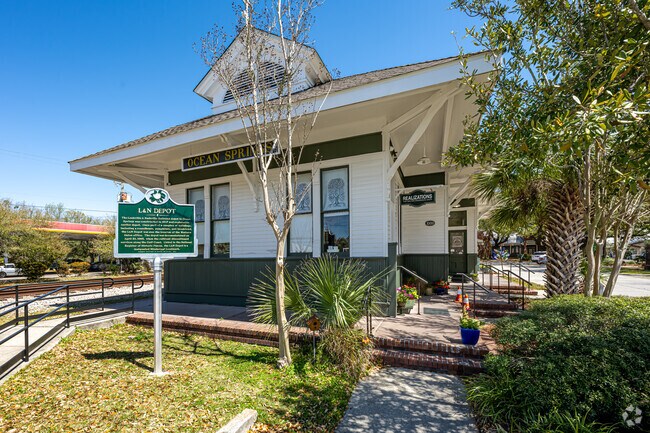 The historic Ocean Springs train depot host the Ocean Springs Fresh Market and other events.