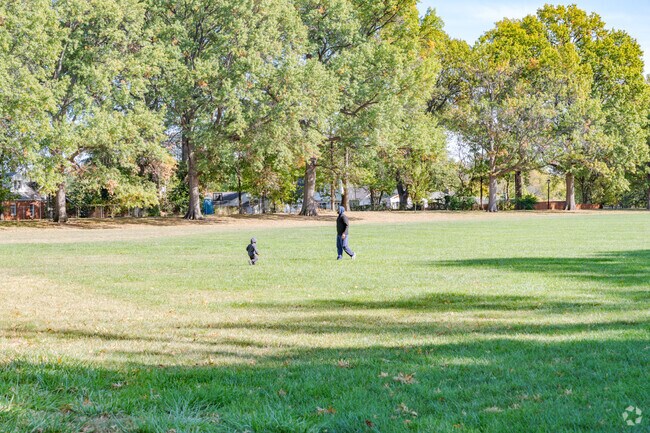 Father and son enjoy time playing in Millar Park just minutes from Hanley Hills.