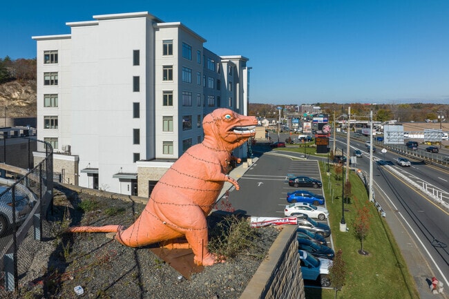 The iconic orange dinosaur greets commuters along Route 1 in Saugus.