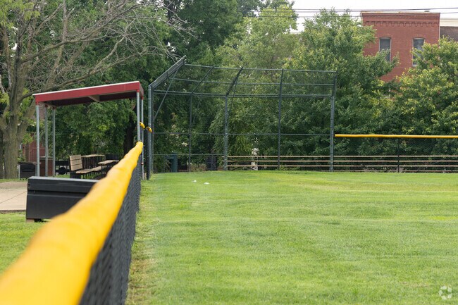 Ray Leisure Park's softball field is fenced with  blencher stands.