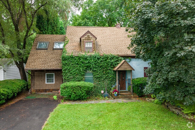 Many homes in DeWitt are secluded in wooded areas, and some residents even grow ivy on them.