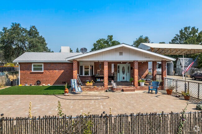 Part of the older side of Oasis you will find smaller ranchers like this brick model.