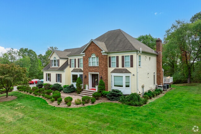 Contemporary and colonial-style homes mix across Washington Township's neighborhoods.