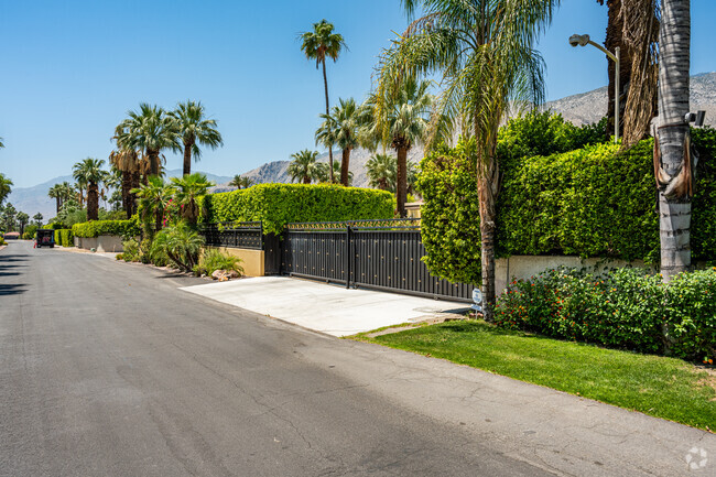 Though most homes in The Movie Colony neighborhood cannot be seen, their hedges are manicured.