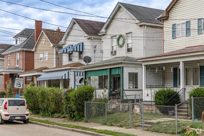 Urban single family houses line the blocks near the downtown area of Stowe.
