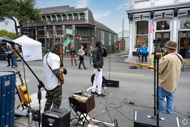 Fairfield residents enjoy live music at the Old Town Farmers' Market on Tuesdays.