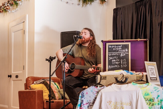 YMCA residents take in live music at the First Thurday ArtWalk in downtown.