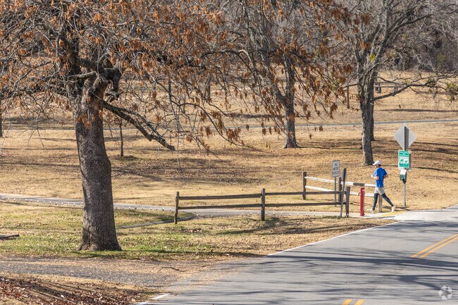 Paved trails at Lake Claremore are popular for walking and jogging.