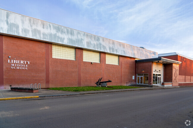 Gymnasium and sculpture feature along side of Liberty Middle School.