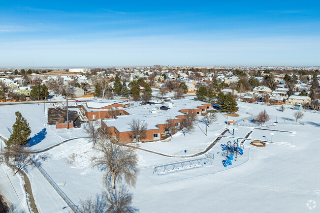 An overview of the rear play area at Tarver Elementary School in Thornton, Colorado.