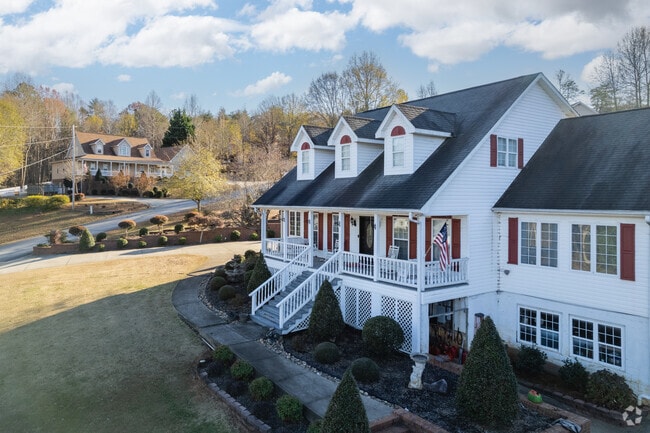 2-story homes with large front porches can be found in the Tigerville hills.