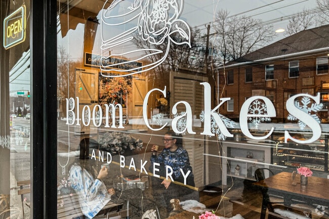 Customers are enjoying a cup of coffee and cake at the Bloom Cakes in Caldwell, NJ.